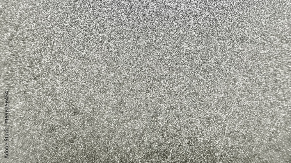 Fototapeta premium silver metallic textured surface with fine granular details ideal for abstract digital design backgrounds or commercial product visuals