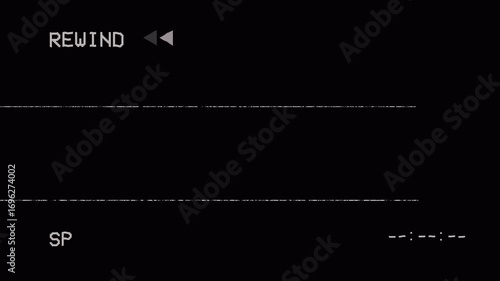 Animation of a vertical VHS tape rewinding on analog TV, showing REWIND text with static noise, visual glitches, artifacts, and imperfections over a black background.