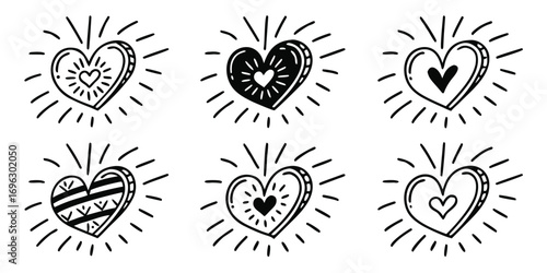 Hand Drawn Heart Icons with Radiant Lines.
