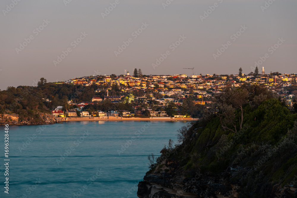 Naklejka premium Dusk view of houses around the Sydney coastal area.