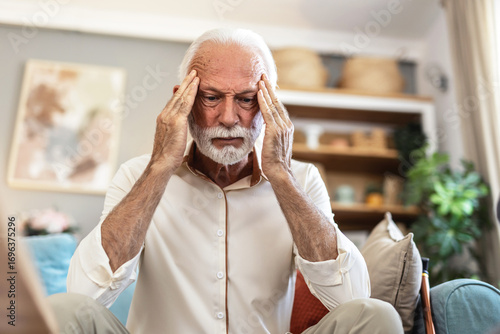 Stress, headache and senior man in home with worrying, overthinking or mental health. Anxiety, mistake and elderly male person with migraine in living room for regret, vertigo or brain fog in house.