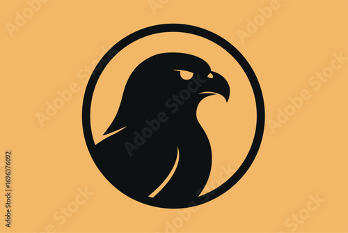 Silhouette of a fierce eagle head within a circular frame on a light orange background.