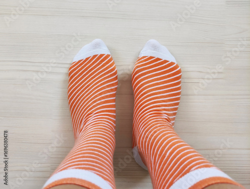 Bright children's multi-colored socks with decorative pattern, top view	