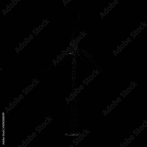 Wind turbine stands tall against a dark background showcasing renewable energy potential in a dramatic visual