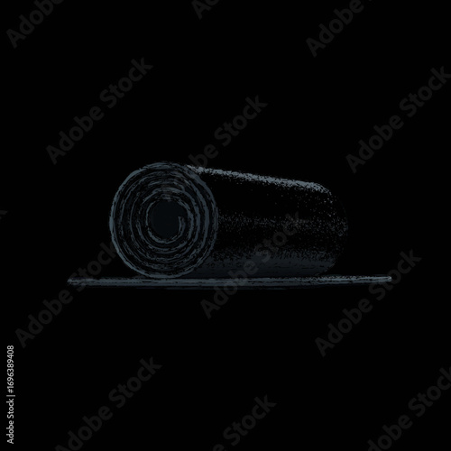 Rolled yoga mat resting on a dark surface before a peaceful session at home