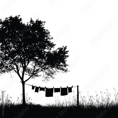 Monochromatic landscape with a large tree clothesline and grassy foreground creating a simple country life scene