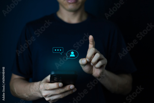 Принти на полотні A man using a smartphone to interact with a friendly AI chatbot, and digital cha