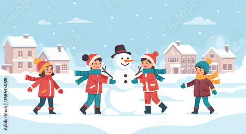 Happy children building a snowman in a snowy village during winter.