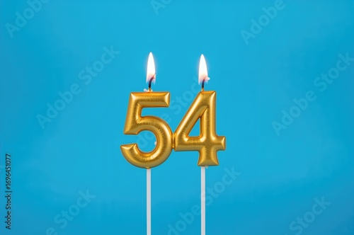Golden candle shaped as num...
