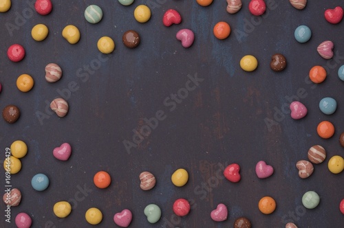Colorful sweets arranged on...