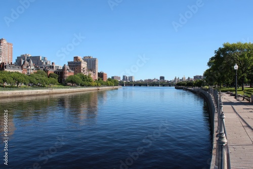 Massachusetts Charles River. The Esplanade: Iconic Boston Attraction with Blue Waters and Riverside Bushes