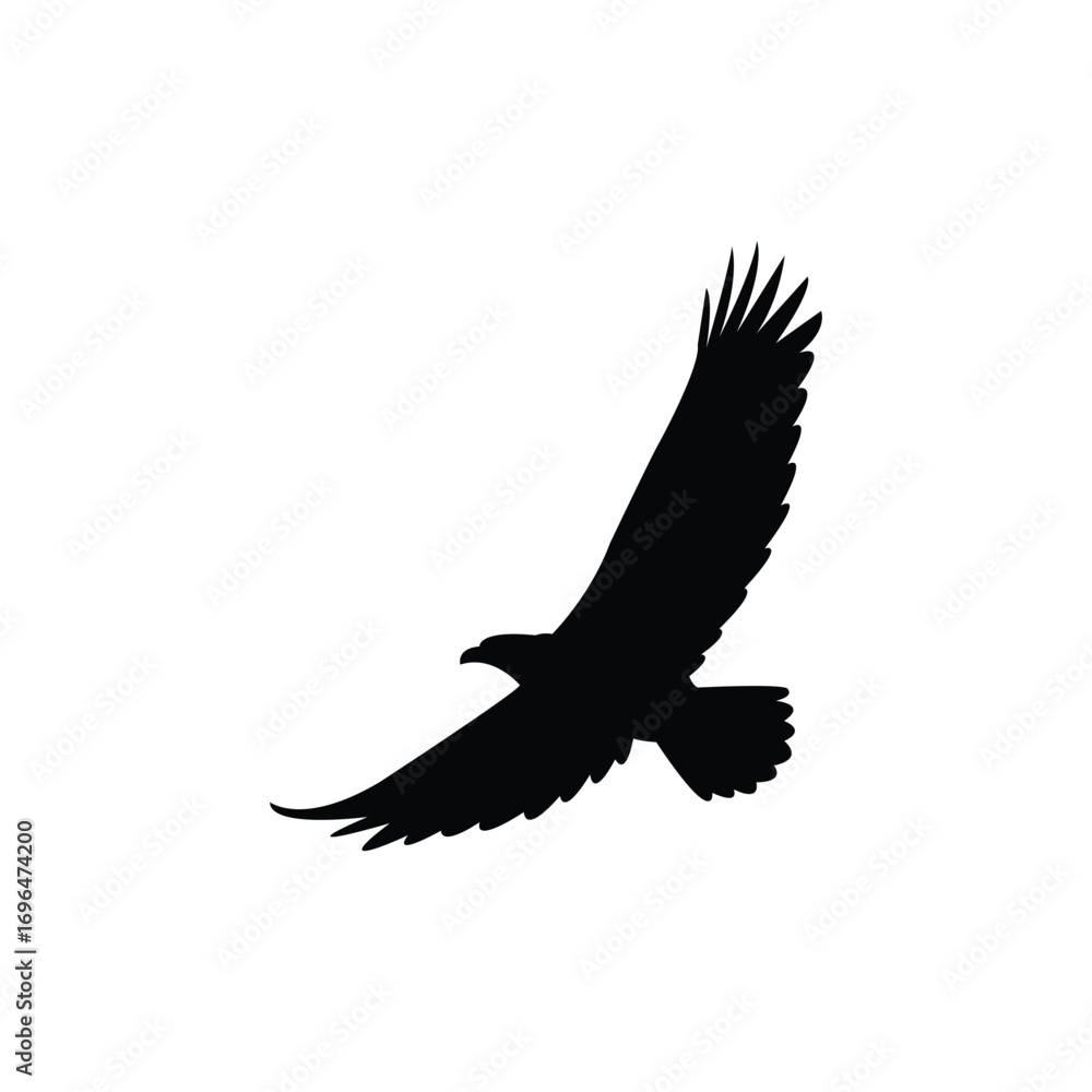 Obraz premium Black silhouette of a soaring eagle with wings outstretched, representing freedom, strength, and grace. Ideal for logos, wildlife art, patriotic themes, tattoos, and minimalist graphic design.