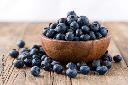 Wallpaper Mural Fresh blueberries arranged on a rustic wooden surface, highlighting wholesome nutrition Torontodigital.ca