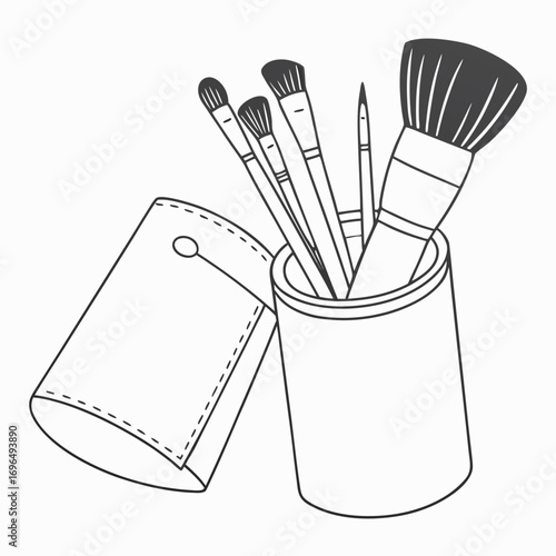 Collection of professional makeup brushes in a holder