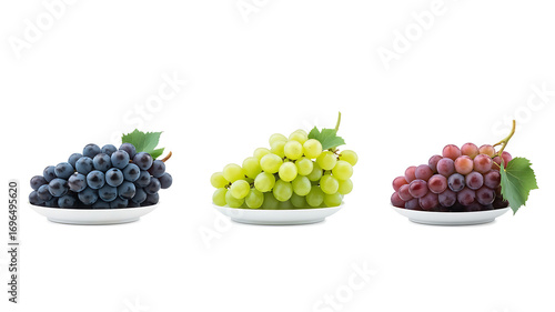 Wallpaper Mural Three separate plates hold bunches of green, red, and blue grapes. Torontodigital.ca