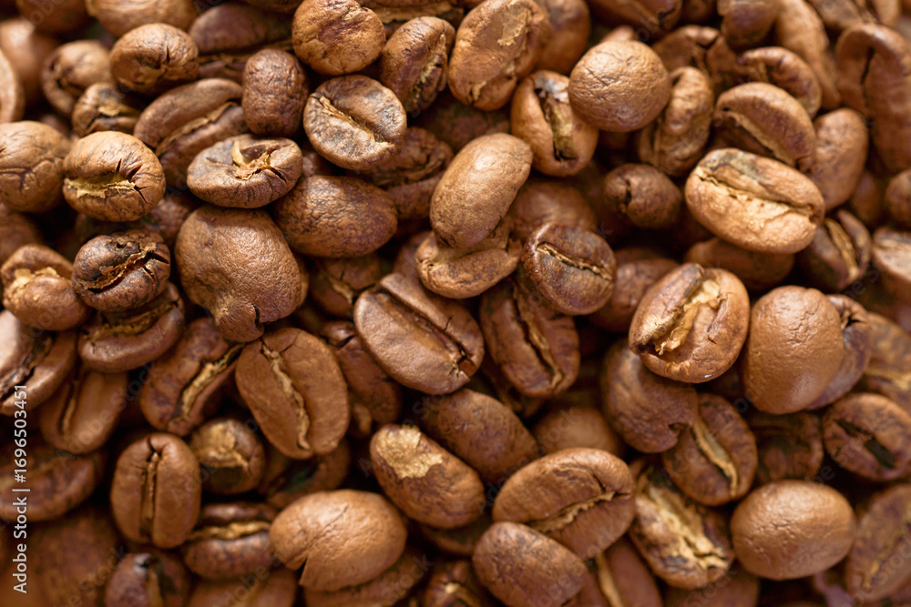 Naklejka premium 浅煎りのコーヒー豆の背景用素材