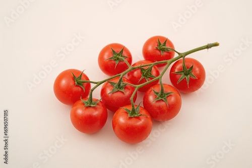 Wallpaper Mural Cluster of ripe red cherry tomatoes on a pale surface, fresh produce, vitality, vibrant, natural, vegetable, nutritious, eating well Torontodigital.ca