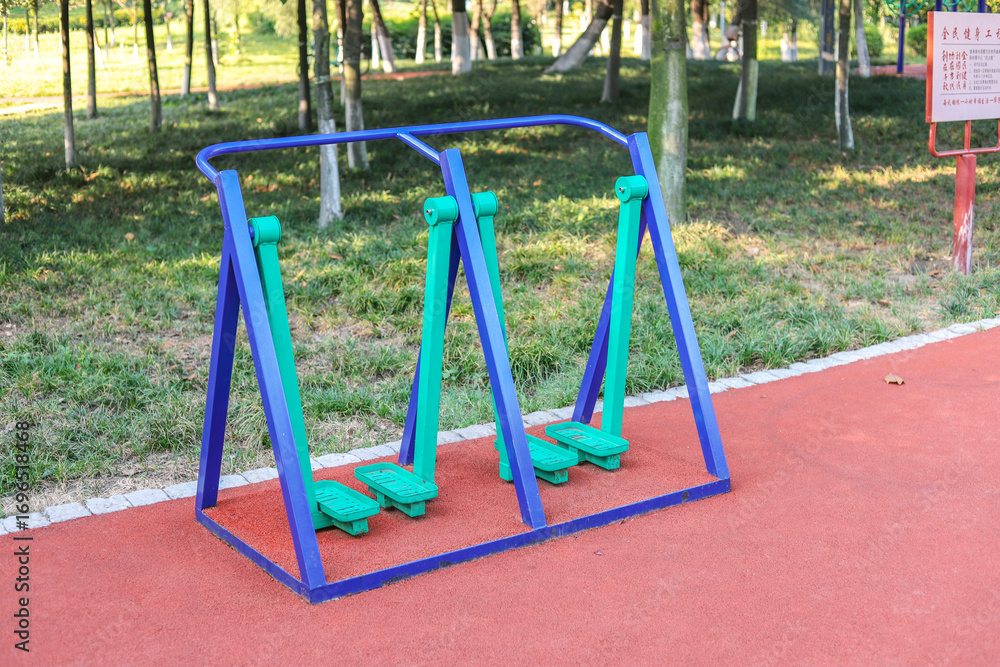 Fototapeta premium The fitness equipment in the park, the two-person walking machine