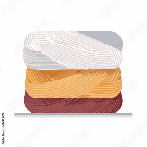 Stack of Three Yarn Skeins in White Orange and Brown