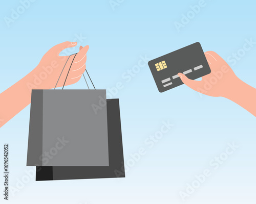 Shopping payment with debit card, hand holding shopping bag and card