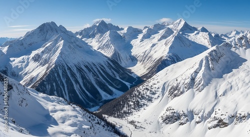 Aerial View of Majestic Snow Covered Mountain Range.