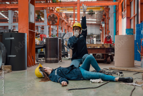 Tableau sur toile A female worker is helping her friend after being electrocuted in a metal cheese factory