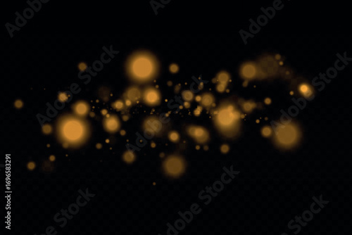 Magical golden cloud of glitter dust. Fine, shiny bokeh glitter particles and fine bright dust. Christmas golden glow effect on transparent PNG background.