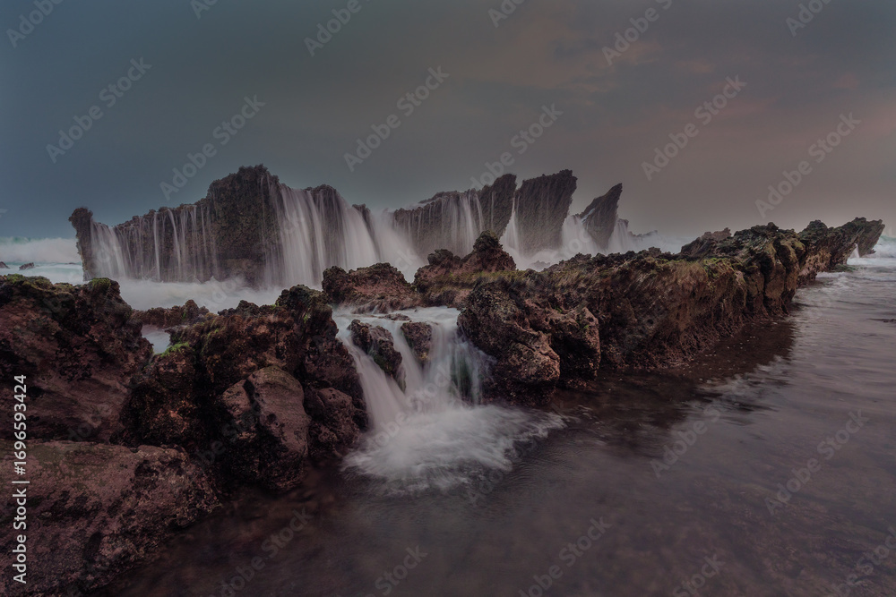 Obraz premium Sunset in Tanjung Layar Beach