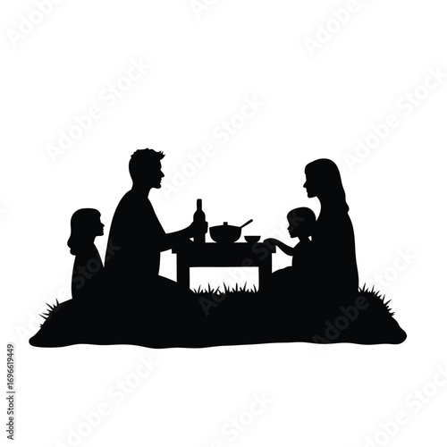 Family picnic silhouette with two children and parents at a table