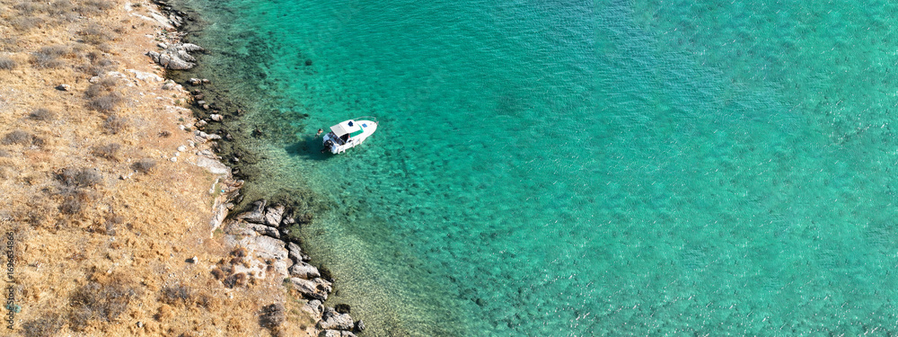 Obraz premium Aerial drone ultra wide photo of tropical exotic bay with crystal clear turquoise sea in paradise Mediterranean island