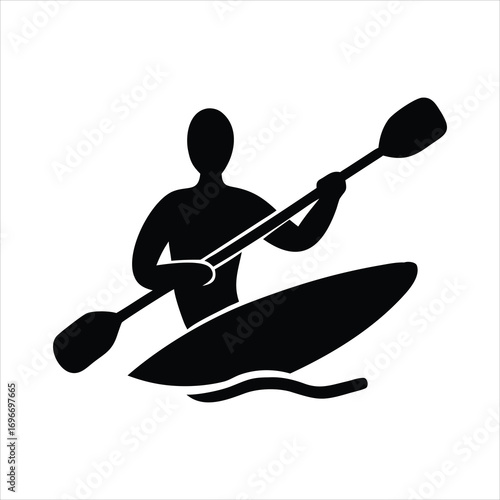 Black silhouette of a person kayaking on water