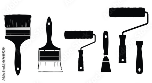 painting tools arranged neatly showing brushes rollers silhouette