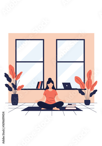Woman meditating and practicing yoga indoors next to books and a laptop