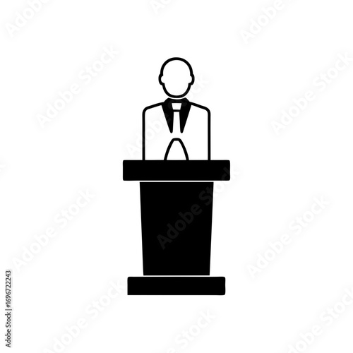 Person standing behind a podium speaking