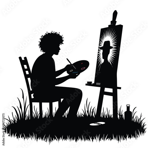 Artist painting self portrait in silhouette outdoors Keywords: artist, painting, self portrait