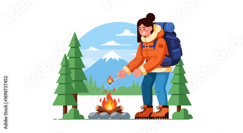 Adventurous Woman Ignites Campfire in Mountainous Landscape Achieving Outdoor Bliss
