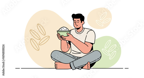 Young Man Holding Bowl Of Rice, Sitting Cross-Legged And Appreciating White Food