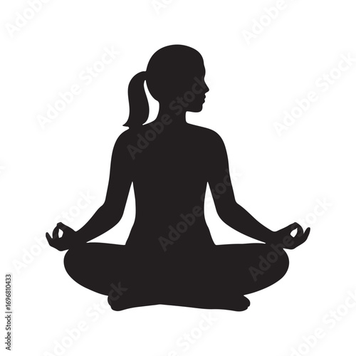 Silhouette of a Woman Sitting Cross-Legged in Meditation Pose