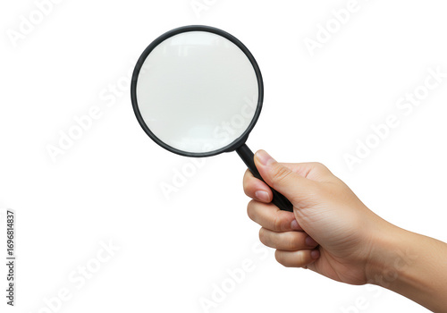 Hand holding a magnifying glass with a dark circular lens isolated on transparent background