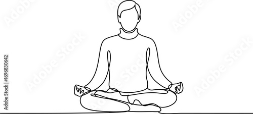 Serene person in lotus pose meditating with eyes closed for inner peace