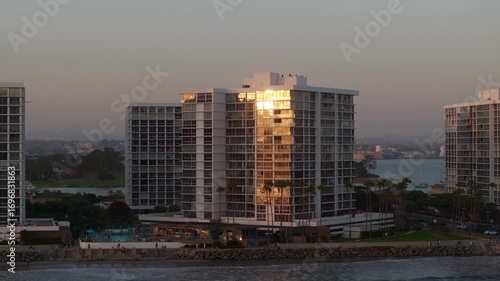 Aerial view of beachfront condominiums in Coronado, California during golden hour