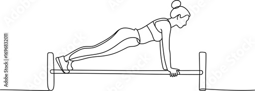 Fit woman in sportswear performing a plank exercise on parallel bars for core strength.