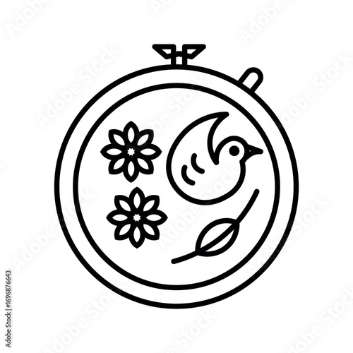 Embroidery hoop with bird and floral design needle thread