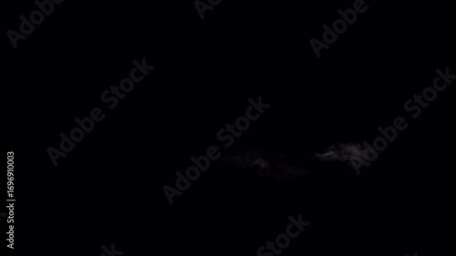 Realistic White Smoke Puff Bursts and Billows Across a Black Background VFX Element