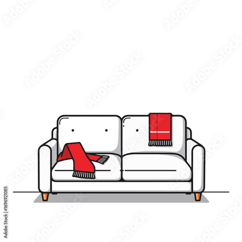 Minimalist red scarf on white sofa, accentuating simplicity