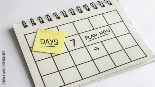 Planning Calendar with Sticky Note to Focus on Important Days