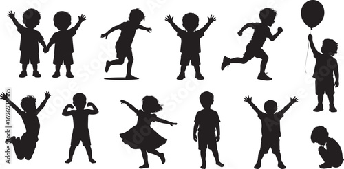 Silhouette of happy children playing, jumping, running, and having fun together