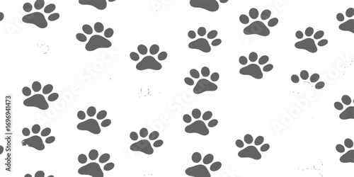 Seamless pattern with a set of black silhouettes of animal paw prints, dog, and cat footprints