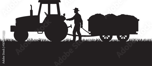 Black silhouette of a farmer with a tractor and loaded trailer in a grassy field harvest agriculture