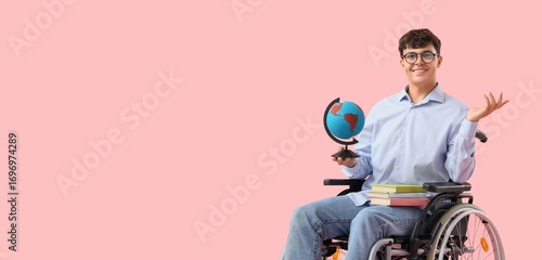 Male Geography teacher in wheelchair on pink background with space for text